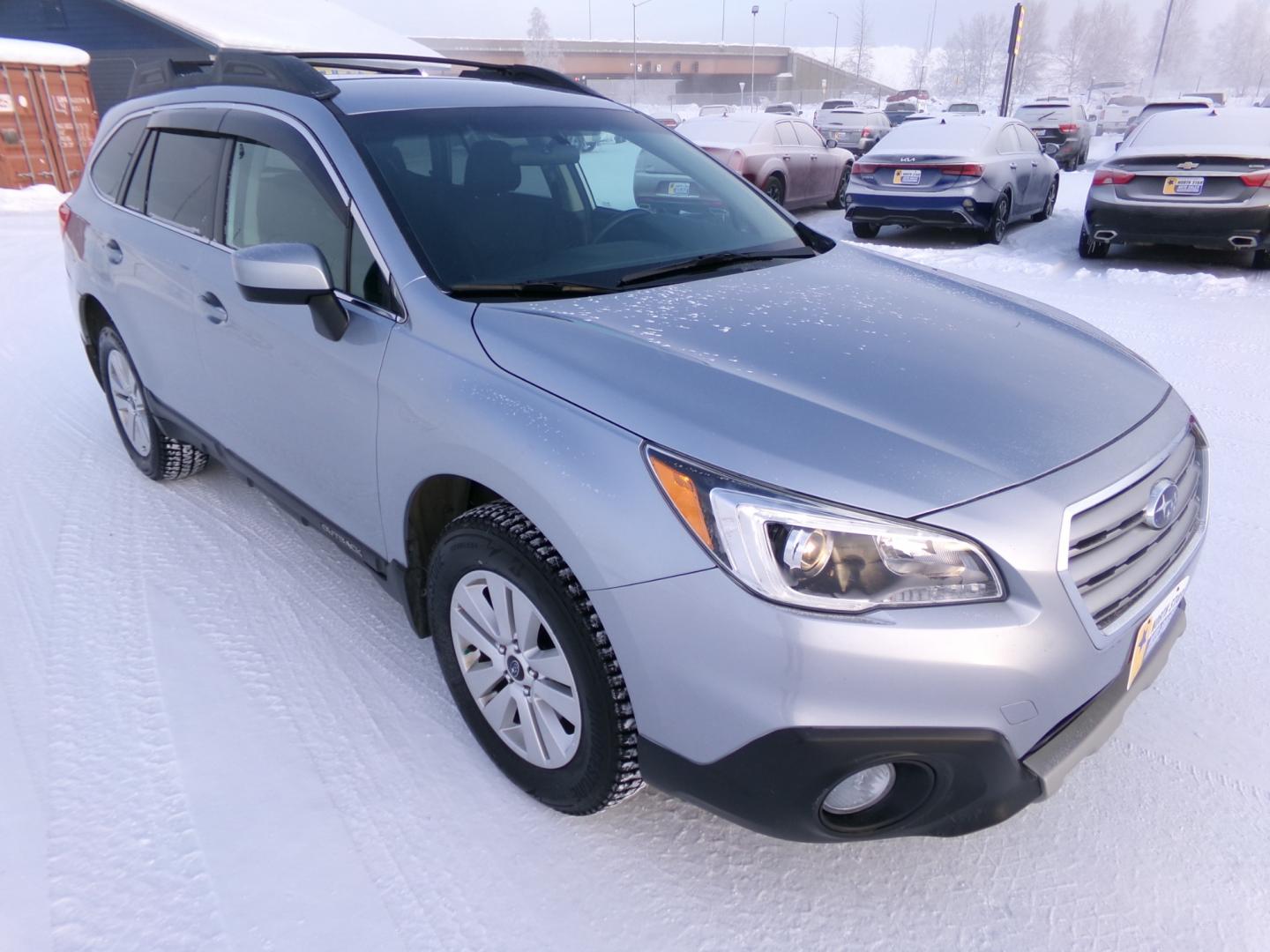 2015 Silver Subaru Outback 2.5i Premium (4S4BSACC9F3) with an 2.5L H4 DOHC 16V engine, 6-Speed Automatic transmission, located at 2630 Philips Field Rd., Fairbanks, AK, 99709, (907) 458-0593, 64.848068, -147.780609 - Photo#0